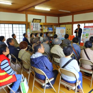 A local disaster preparedness center with residents attending a workshop.